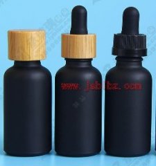 黑色磨砂玻璃瓶压旋滴管胶木盖竹制瓶盖批发